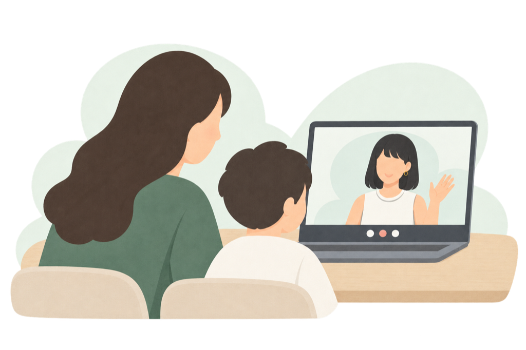 保護者と子どもが、パソコンを通して相談員と話している様子